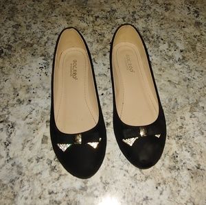 Black and gold flats